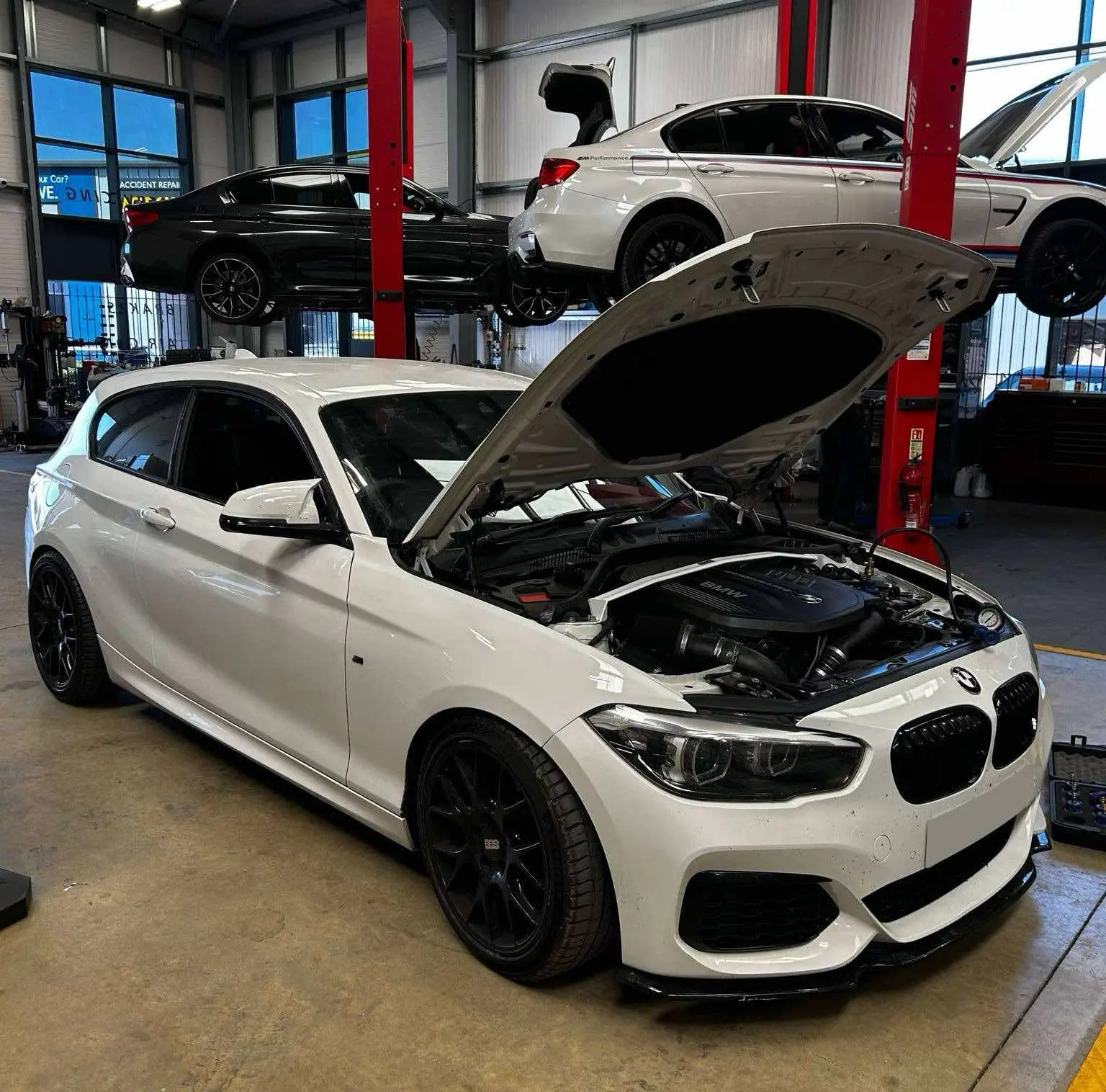 White BMW lifted bonnet at Bartlett Automotive